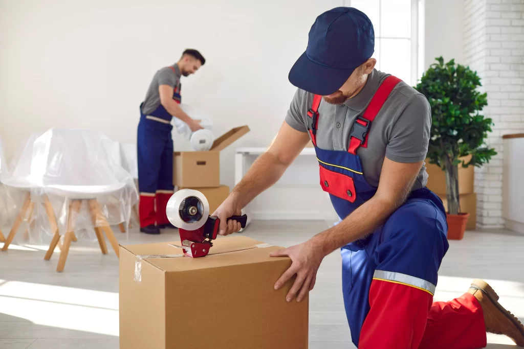 Professional Movers Packing Belongings